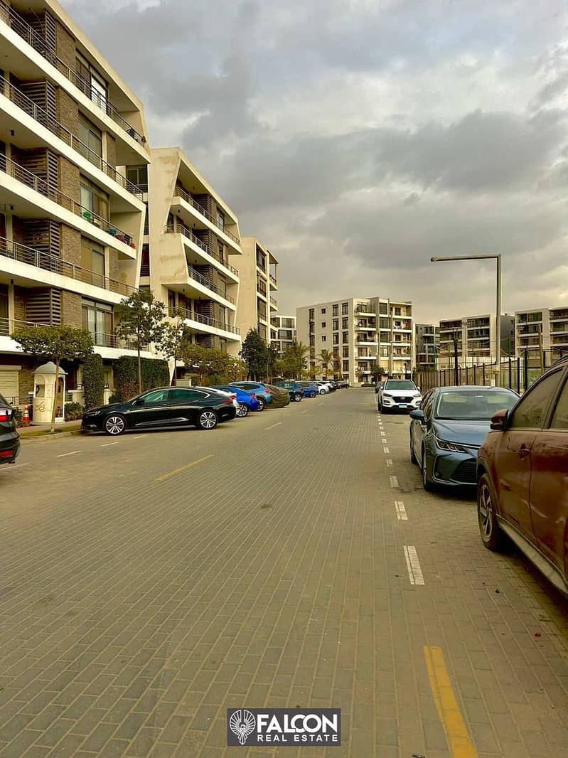 With a 42% discount, an apartment for sale in front of Cairo International Airport in Taj City Compound 4