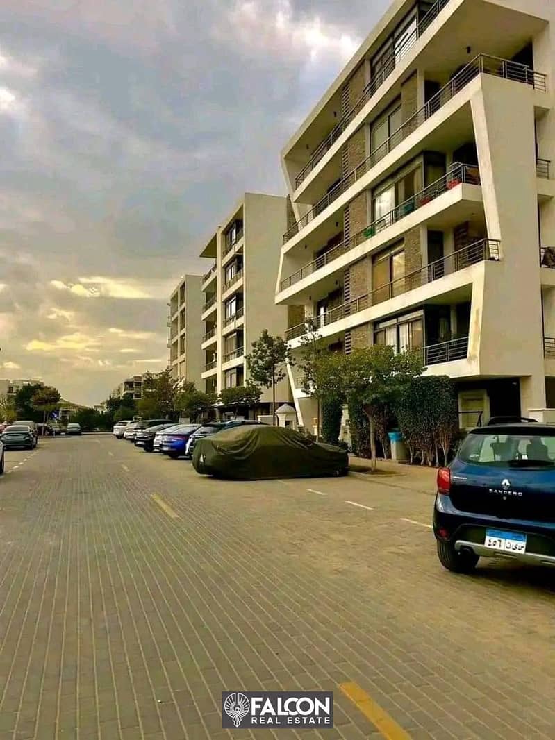 With a 42% discount, an apartment for sale in front of Cairo International Airport in Taj City Compound 6