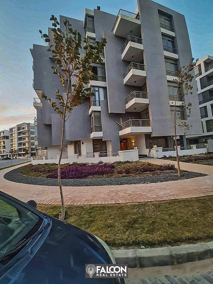 With a 42% discount, an apartment for sale in front of Cairo International Airport in Taj City Compound 8