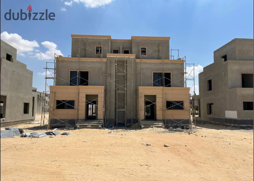 Live in a villa with a landscape view, in installments over 9 years, in a prime location in Sheikh Zayed, from NAIA West, next to SODIC 12