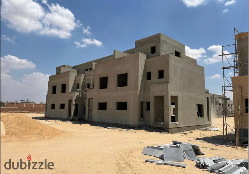 Live in a villa with a landscape view, in installments over 9 years, in a prime location in Sheikh Zayed, from NAIA West, next to SODIC 13