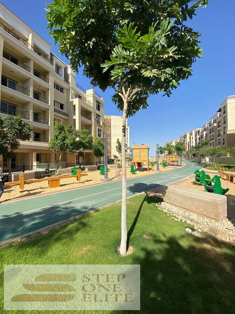 Apartment for sale, 130 square meters + private garden, in Sarai directly next to Madinaty, interest-free installments 7