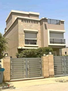 On the Suez Road in front of Cairo Airport, a villa for sale in installments in the Taj City Compound, New Cairo