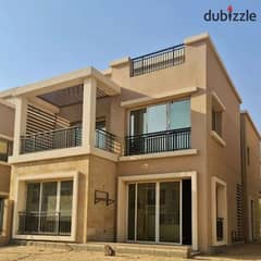 villa for sale on Suez Road and in front of Cairo International Airport in Taj City From Madient masr Company