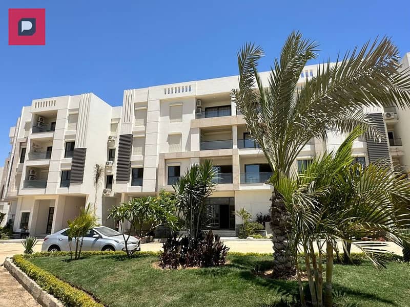 145 m hotel apartment for sale in installments over 6 years in Valore Sheraton Compound next to City Center Maadi View Landscape and Green Area 0