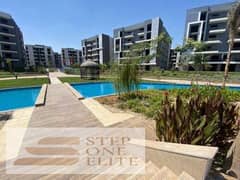 Apartment with private garden for sale in Sun Capital October Compound near Zayed