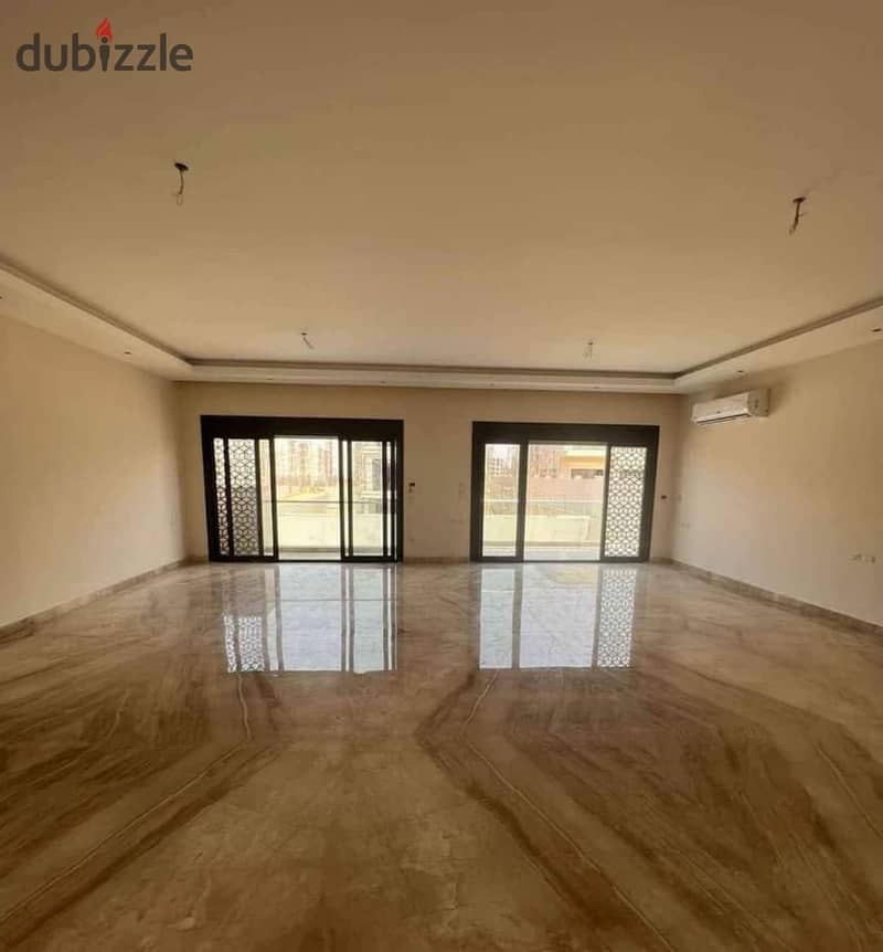 Apartment with Garden Ready to move and finished in The Address East New Cairo 0