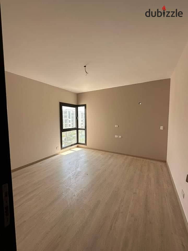 Apartment with Garden Ready to move and finished in The Address East New Cairo 1