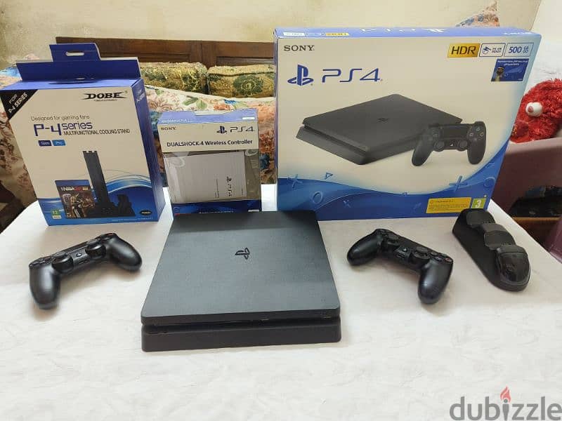 playstation 4 slim 500gb + 2 original controller+ 7 offline games 0