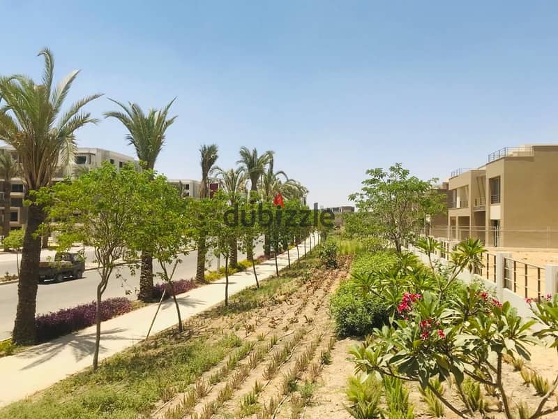 Family house for sale in compound palm hills new Cairo , A prime view , with an area 252 m 1