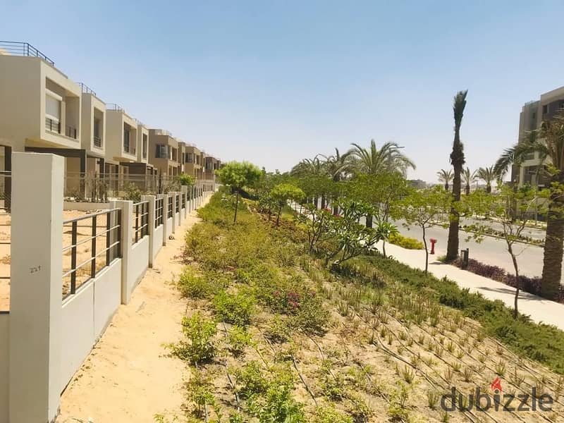 Family house for sale in compound palm hills new Cairo , A prime view , with an area 252 m 12