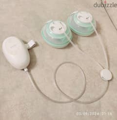 Elvie stride double breast pump from America like New