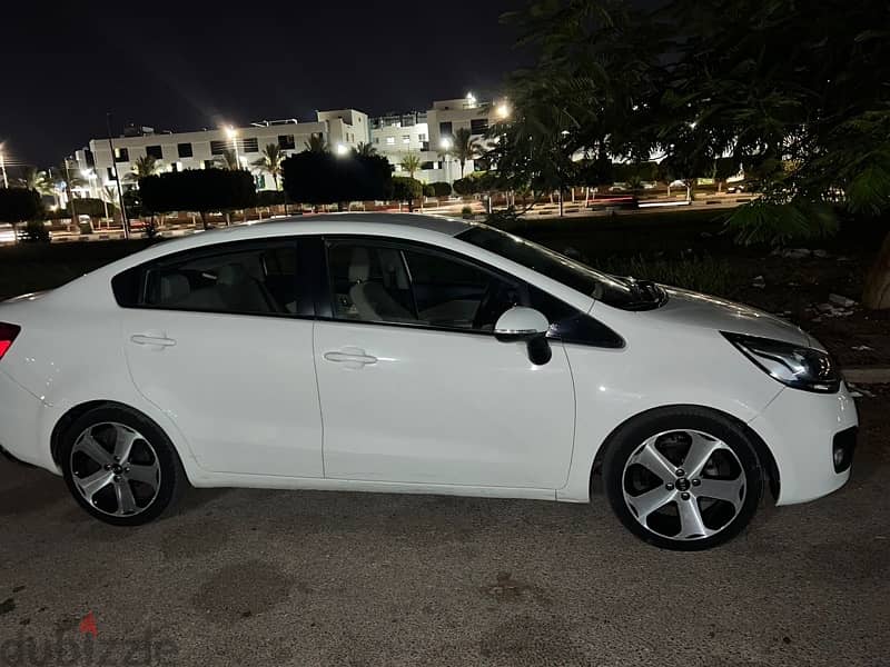 kia rio sedan 2013  كيا ريو سيدان فابريكه بره وجوه 1