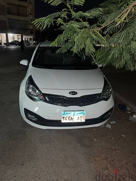 kia rio sedan 2013  كيا ريو سيدان فابريكه بره وجوه 2