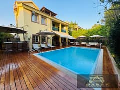 A villa for sale in Madinaty, featuring custom finishes, fully independent with a swimming pool, offered at the best price. For those who love exclusi