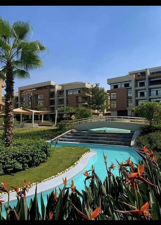 Apartment for sale in the most luxurious place in the new Capital, in R8, 5% down payment and installments up to 9 years in The Islands Compound 4