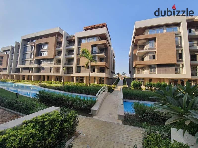 Apartment for sale in the most luxurious place in the new Capital, in R8, 5% down payment and installments up to 9 years in The Islands Compound 6