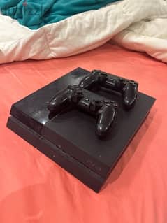 PlayStation 4 with 2 controllers