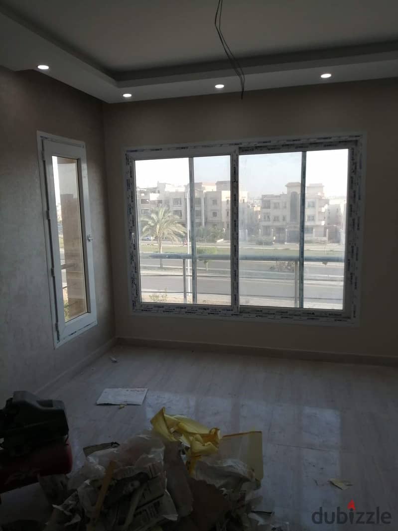 Apartment * Resale * ready to move in double view in Karma - Badr El Din, the heart of Sheikh Zayed | Fully finished, Super Lux With a private garage 9