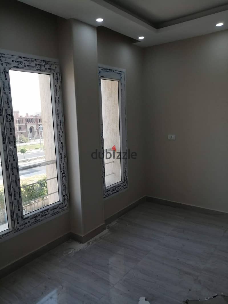 Apartment * Resale * ready to move in double view in Karma - Badr El Din, the heart of Sheikh Zayed | Fully finished, Super Lux With a private garage 11