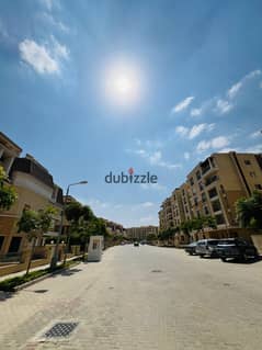 Ground floor apartment with a garden, two rooms, 111 m, with a garden of 130 m, for sale next to Madinaty in Sarai Compound, with installments over 8