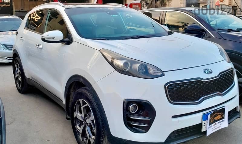 Kia Sportage 2019كيا سبورتاج أعلي فئة فابريكة بمقدم ٤٥٠ الف 6