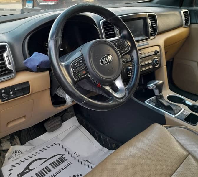 Kia Sportage 2019كيا سبورتاج أعلي فئة فابريكة بمقدم ٤٥٠ الف 7