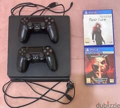 PS4 with 2 Controllers and with 4 Games