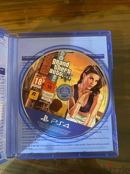 PS4 slim 1TB used like new with 3 controllers , GTA5 ,Crash,cd 1