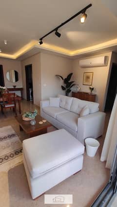 Apartment for rent in Sheikh Zayed Towers with kitchen and air conditioners