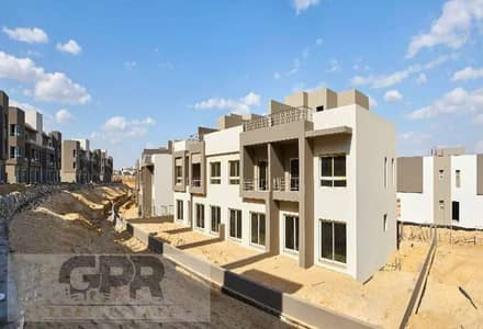 Twin house for sale in Naia West, Sheikh Zayed, in front of Beverly Hills