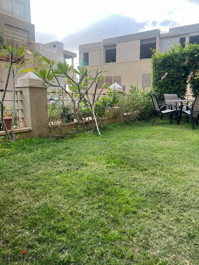 for sale . . elegant duplex with garden in village gate compound near to auc (new cairo) دوبلكس للبيع مميز بكمبوند فيلدج جيت بالم هيلز التجمع الخامس 5