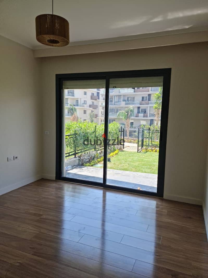 Ground floor apartment with garden for rent in Villette Sodic Compound, with kitchen and air conditioners, at a bargain price 12