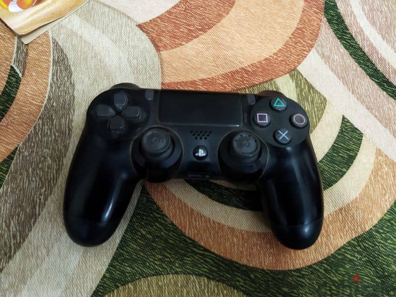 ps4 - بلايستيشن ٤  بكل مشتملاته  معاه ٨ العاب الصور داخل الاعلان 4