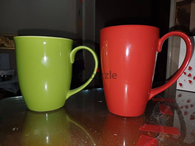 RAK porcelain mug new with box. color(green)(red) 4