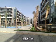 A luxurious apartment with a private garden fully finished, immediate receipt, ready to move in El Patio 7 Compound - Fifth Settlement - New Cairo