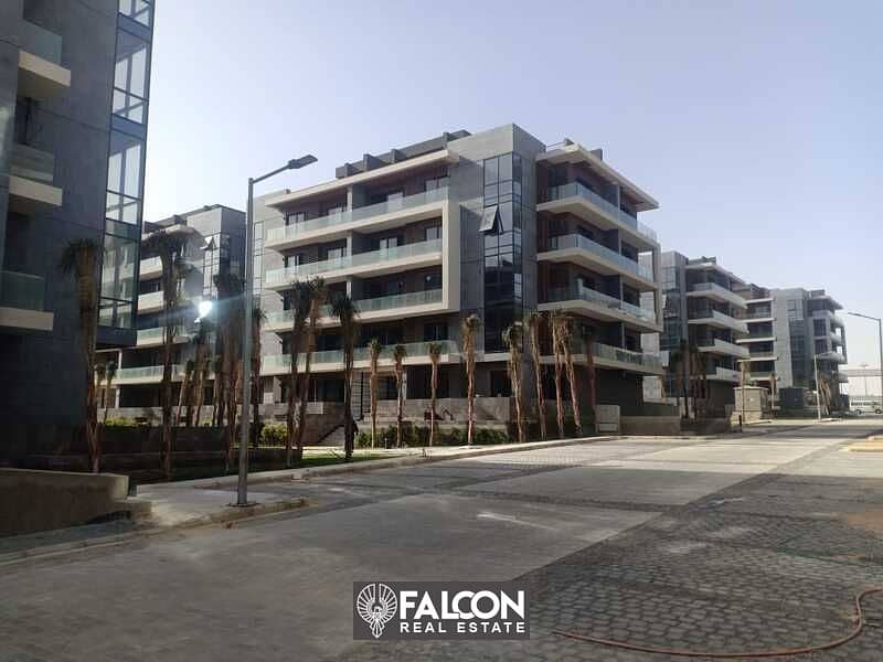 A luxurious apartment with a private garden fully finished, immediate receipt, ready to move in El Patio 7 Compound - Fifth Settlement - New Cairo 3