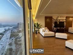 A luxury hotel apartment directly on the Nile Corniche, with luxurious finishes and furnishings and the latest appliances and air conditioners, RTM