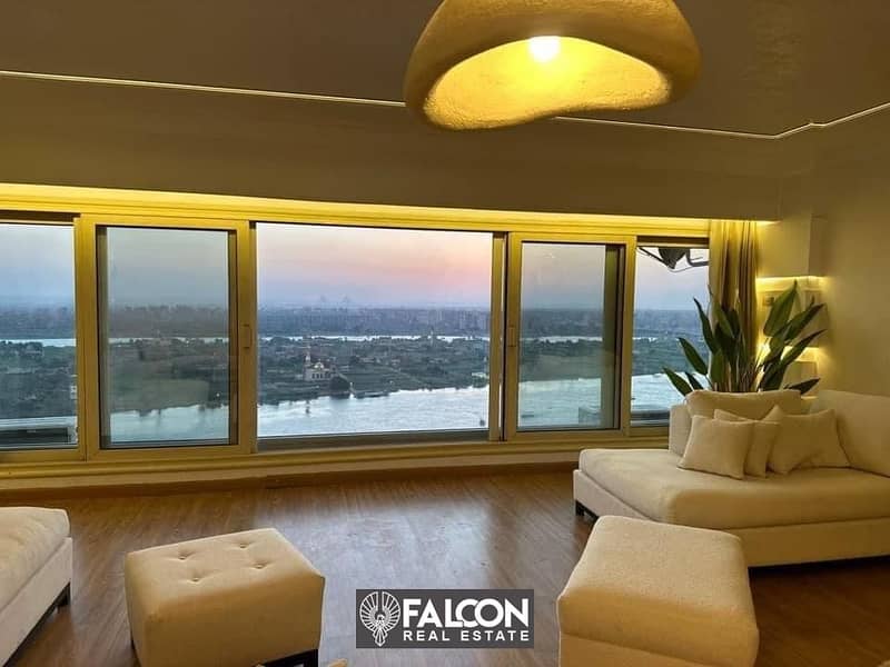 A luxury hotel apartment directly on the Nile Corniche, with luxurious finishes and furnishings and the latest appliances and air conditioners, RTM 2