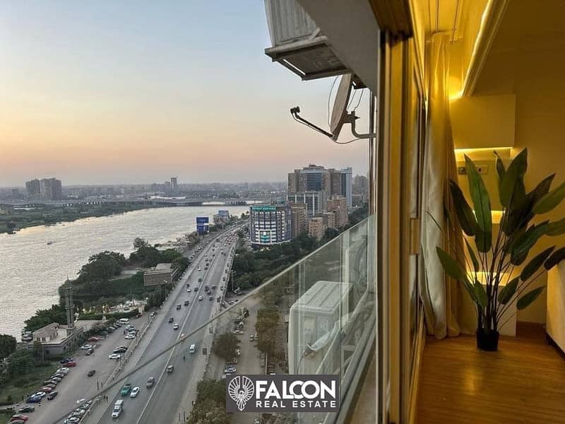 A luxury hotel apartment directly on the Nile Corniche, with luxurious finishes and furnishings and the latest appliances and air conditioners, RTM 3