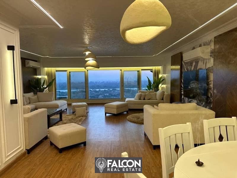 A luxury hotel apartment directly on the Nile Corniche, with luxurious finishes and furnishings and the latest appliances and air conditioners, RTM 7