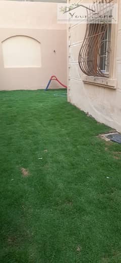 Ground apartment with garden for sale, 7th District, Sheikh Zayed