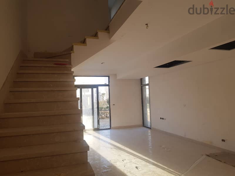 Twin house for sale at Owest فيلا توين هاوس للبيع بكمبوند أويست 9