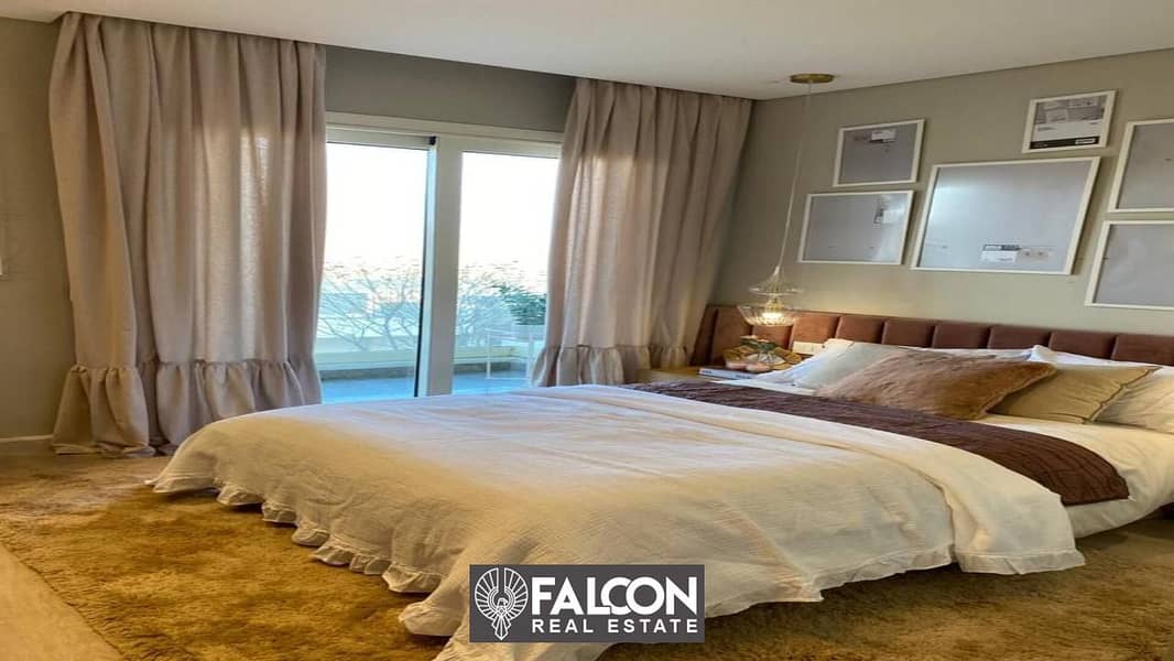 Immediately receive a fully finished apartment in Double View Lagoon and El Alamein Towers, with installments up to 12 years, in the Latin Quarter, No 7