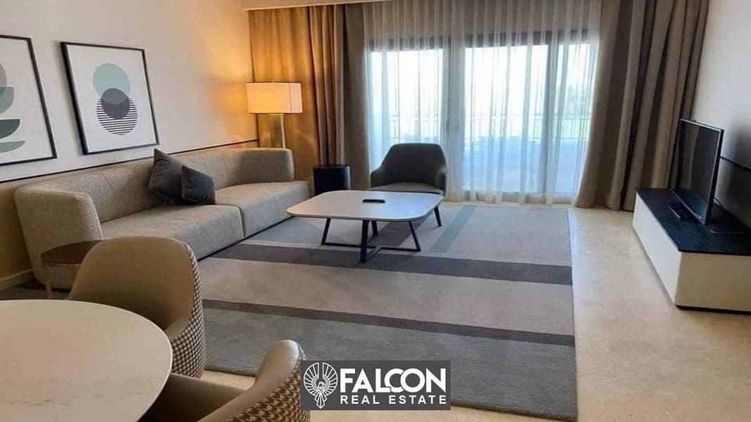 Immediately receive a fully finished apartment in Double View Lagoon and El Alamein Towers, with installments up to 12 years, in the Latin Quarter, No 11