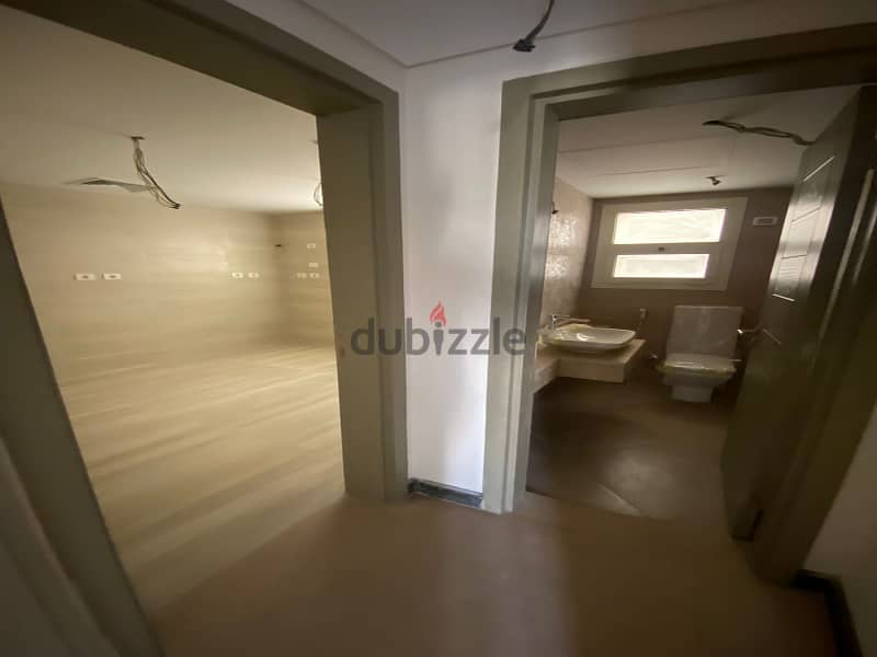 Apartment for sale at New Giza شقة للبيع بكمبوند نيو جيزة أمبرفيل 1