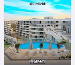 A fully finished apartment with an Emirati design near the American University, with installments over 10 years and delivery soon, ready for inspectio