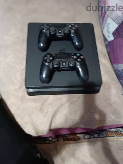 PS4 slim with FIFA 24 , need for speed heat, Tekken , two controllers