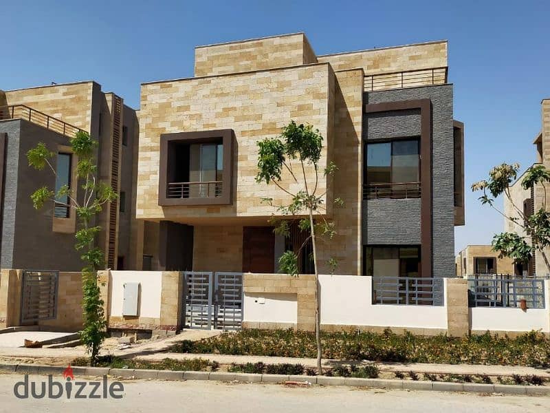 Two-room apartment for sale in a 73-meter private garden in Taj City, with a 5% down payment and a cash discount of up to 39% in the Fifth Settlement 9