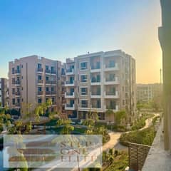 Apartment + private garden for sale in the most important location in New Cairo (near the American University)